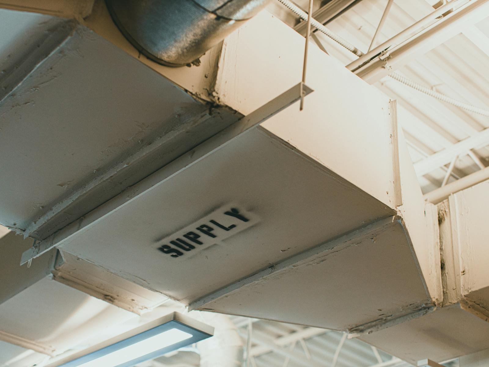 Commercial sheet metal duct installed in a ceiling